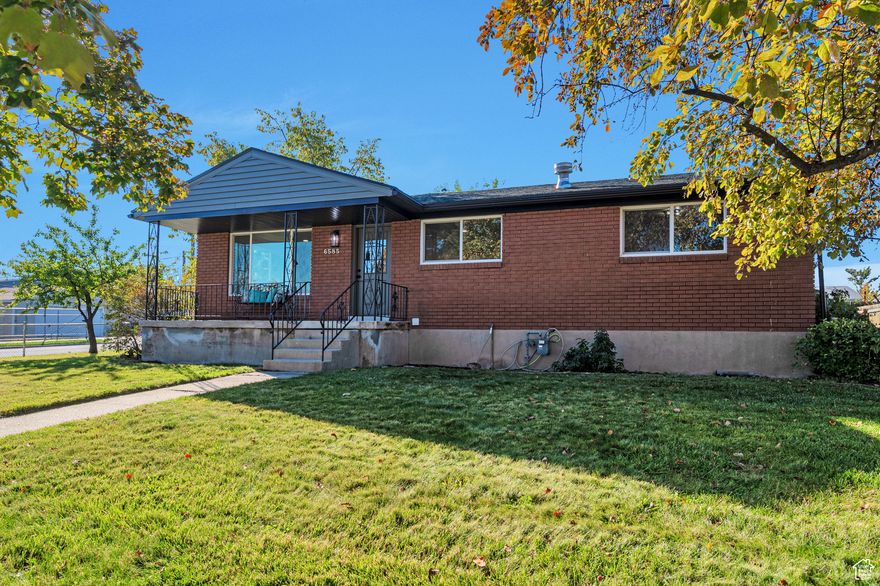 Welcome to your dream home! This fully renovated property combines modern style with everyday comfort. Step inside to find brand-new double-pane vinyl windows, a custom designer kitchen with quartz countertops, new stainless steel appliances, and a huge island that's perfect for family meals, entertaining guests, or just enjoying your morning coffee.  The open layout makes this home feel bright and spacious, while thoughtful updates give it a truly move-in-ready feel. Outside, you'll love the fully covered patio-ideal for summer barbecues and gatherings in the shade. The yard is stunning, featuring mature trees and a well-maintained landscape that adds both charm and privacy.  A detached, extra-wide garage provides plenty of space for vehicles, tools, and storage. And the location can't be beat-you're just minutes from Mountain View Corridor, with shopping, dining, and amenities all close by.  This home has it all: style, comfort, and convenience. Come see it today-before it's gone!