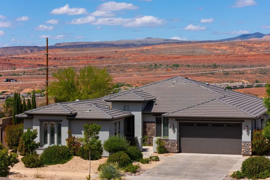 Perched on a quiet street in the outskirts of the city of Washington, this stunning residence offers a front-row seat to Utah's legendary red mountain vistas and views of Pine Valley. Designed for those who value both luxury and utility, the property features extra parking which isperfect for guests or adventure gear. This incredible home features 4 bedrooms (including an attached casita with separate an entrance), 3.5 bathrooms, tandem 3 car garage, 2,378 SqFt, built in 2015, and 0.29 acres. Some of the best features of the home are absolutely magnificent mountain views, custom built pool with spa, ceiling built-in speaker system, fireplace, outdoor kitchen, granite countertops, ceiling fans in every room, large open concept living room, large laundry room with utility sink, tile flooring, large windows, motorized blinds and plantation shutters, and 19 solar panel system. For guests or a private home office, theattached casita provides flexibility with its own entrance. The backyard is a private oasis designed for the ultimate entertainer. Take a dip in the sparkling pool that blends into the mountain horizon, host dinner from the outdoor kitchen, or gather around the fire pit to watch the stars emerge over the peaks.The Coral Canyon community features a large clubhouse with fitness center, entertainment/conference space, pickleball court, tennis court, indoor and outdoor pool, 6 playgrounds, 2 city parks, and over 10.7 miles of paved trail system within the community. There are multiple community clubs to join based on your sense of adventure. The community is also surrounded by the 7,029-yard, par-72, and 18 holes Coral Canyon Golf Course with 55 sand bunkers, two lakes, and a labyrinth of dry washes to challenge the inner-golfer in all of us. In addition the home is a short drive to some of America's most breathtaking destinations, including Zion National Park, Bryce National Park, and the north rim of the Grand Canyon. Other nearby state parks and national forests, include Sand Hollow Reservoir, Gunlock Reservoir, Quail Creek Reservoir, and Dixie National Forest that enhance the allure of the location. One of the best places to live for those that love the outdoors, biking, hiking, fishing, ATVing, and all other high-desert adventures.All information herein is deemed reliable but is not guaranteed. Buyer is responsible to verify all listing information, including square feet/acreage, to buyer's own satisfaction