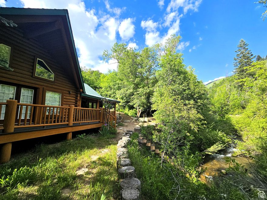 Beautiful log cabin in immaculate condition nestled on Birch Creek with pine, aspen, and cottonwood trees! Single level living with a master suite which has direct access onto the deck overlooking the creek. Enjoy the sound of living on a creek and nature anywhere you are on the property. This property comes with a moose which stops by from time to time. Cabin is being sold fully furnished. It is loaded with furniture and decorations befitting such a cabin and setting. Don't miss the working antique stove in the kitchen or the clawfoot tub in the master suite and many other unique antiques and furnishings. Cabin features a large open loft with plenty of space for games and beds. Over 5.8 acres spread out on two lots. Includes a detached garage which could be used as a workshop or any number of ideas you might have for it. This cabin is the perfect location, easy to get to and less than one mile from year round access and less than one hour from Utah County. Enjoy your very own cabin property nestled in a mountain resort with cool crisp mountain air and get away from it all. Skyline Mountain Resort has so many activities from a swimming pool to a 9 hole golf course, pickleball, tennis, and much more. Enjoy the Manti-LaSal National Forest and all that Skyline Drive has to offer close by; hunting, fishing, lakes, hiking, exploring, hundreds of miles of ATV trails and similar terrain for snowmobiles and winter recreation. Just a few minutes from all the small-town amenities like a hospital, hardware and grocery store, community indoor swimming pool, even a drive-in theater. Controlled community gate entrance. Power is connected. Property has a septic system. Water is from a community fill station or form a share you own. Elevation is 6,818. MLS map is correct. Google Maps/Earth is 39.59257, -111.37293. Buyer to verify all information. Square footage figures are provided as a courtesy estimate only and were obtained from the county. Buyer is advised to obtain an independent measurement.