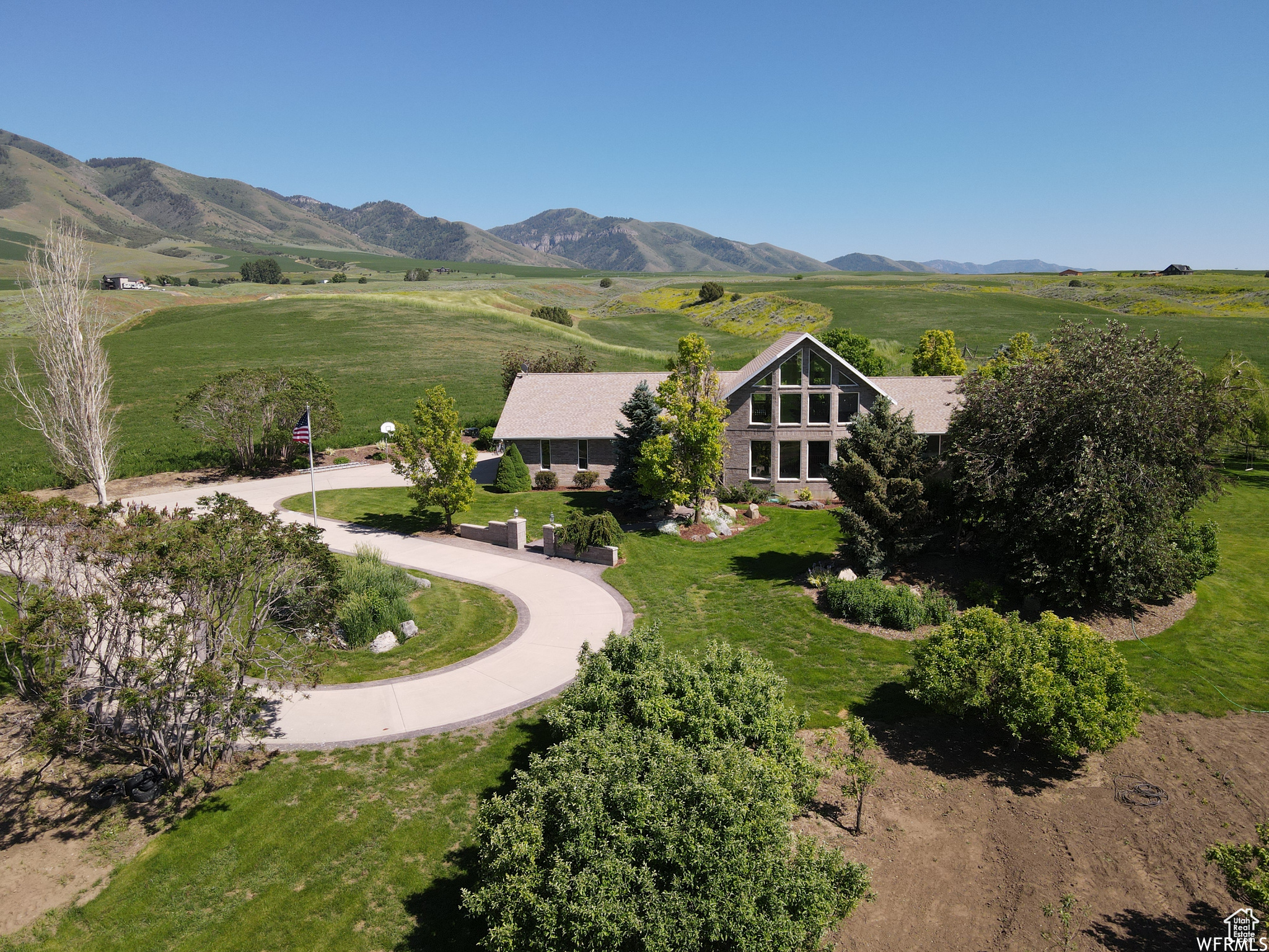 Don't miss this incredible 3.32-acre property with breathtaking views! Featuring horse property with pasture and irrigation, a huge 40x60 shop, a beautiful country home,  a gardener's paradise. New windows in 2024 on main and 2nd level, new roof in 2020.  Buyer to verify all information, including square footage. Agent is related to the seller.