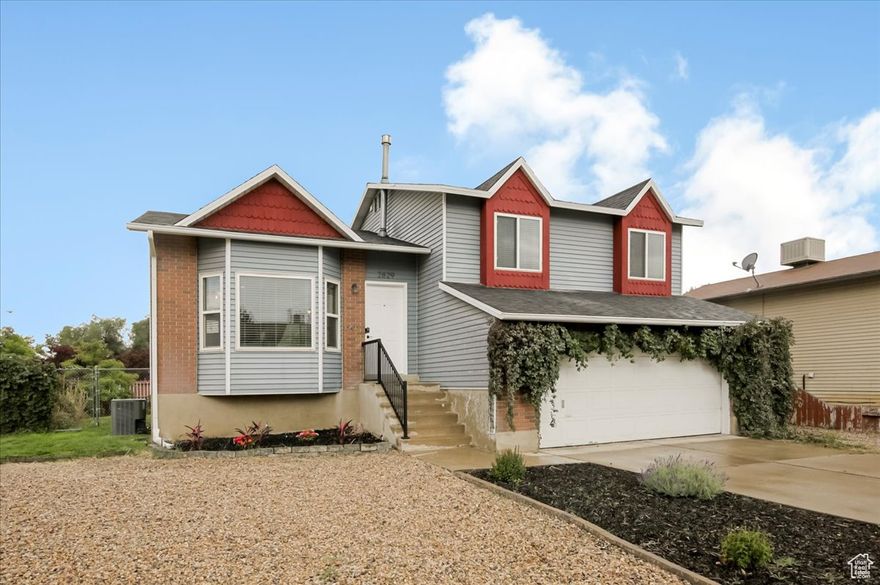 Charming Corner-Lot Home in Roy  Move-In Ready! Welcome to this beautifully refreshed 4-bedroom, 2-bath home perfectly situated on a spacious corner lot in a quiet Roy neighborhood. Step inside to find new carpet, fresh paint, and updated tile flooring that make the whole space feel bright and inviting. The open layout offers plenty of room for family living and entertaining, with natural light pouring in from every angle. Outside, you'll love the fully fenced backyard-ideal for pets, play, or relaxing evenings-and don't miss the vibrant wildflower patch that adds a touch of color and charm all summer long. The xeriscaped front yard gives great curb appeal, while the large RV parking area means there's space for all your toys and guests.