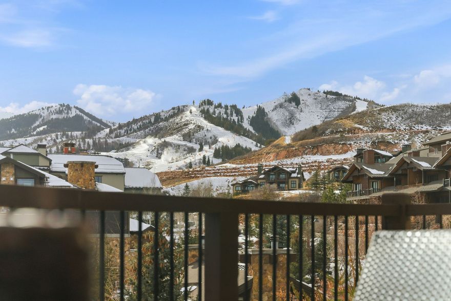 Waldorf Penthouse with Ski Resort Views. Ranked #4 Best Resort in the World by Cond Nast Traveler, Waldorf Astoria is the premier amenity rich hotel at Canyons Village Park City. True luxury meets mountain adventure in this 2 bedroom penthouse, featuring refined mountain-contemporary design and easy access to world-class skiing. This particular penthouse has a premier location within the Waldorf, situated away from the lobby & bustle of the hotel, with large picture windows displaying ski resort views, and 2-story vaulted ceilings. A thoughtful layout boasts 2 en-suite bedrooms, spacious living & dining areas, and a chef's kitchen with Viking appliances. Stay warm and cozy with fireplaces in every room. Take in the fresh mountain air and serene views on a private balcony. This quiet penthouse residence offers 3 different rental configurations, providing exceptional flexibility for owners seeking personal enjoyment, rental income, or both simultaneously. This residence sleeps 8. The main door holds a king suite with jetted tub, full kitchen, living & dining areas, 2 fireplaces, private balcony, and sleeper sofa. The lock-off offers a 2 Queen suite, private bathroom, kitchenette, and fireplace. Enjoy exceptional convenience with the Frostwood Gondola steps away and a ski valet who transports you and your gear in a golf cart, as well as stores your gear, ensuring a truly hassle-free day without parking lot lift lines. In the summer, enjoy mountain biking, hiking, golf, dining, and concerts. Waldorf has a multitude of world-class amenities, including concierge, heated outdoor pool with poolside dining, hot tub, fire pit, steam room, state-of-the-art fitness center, award-winning spa and wellness center, acclaimed Powder restaurant, on-site rentals, business services, private shuttle & valet parking. Washer/dryer in unit for your convenience. Whether you seek adventure on the slopes or relaxation in a sophisticated setting, this Waldorf residence offers a rare blend of convenience, comfort, and luxury.