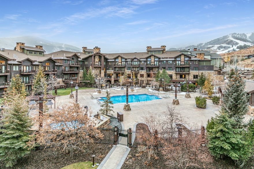 Waldorf Penthouse with Ski Resort Views. Ranked #4 Best Resort in the World by Cond Nast Traveler, Waldorf Astoria is the premier amenity rich hotel at Canyons Village Park City. True luxury meets mountain adventure in this 2 bedroom penthouse, featuring refined mountain-contemporary design and easy access to world-class skiing. This particular penthouse has a premier location within the Waldorf, situated away from the lobby & bustle of the hotel, with large picture windows displaying ski resort views, and 2-story vaulted ceilings. A thoughtful layout boasts 2 en-suite bedrooms, spacious living & dining areas, and a chef's kitchen with Viking appliances. Stay warm and cozy with fireplaces in every room. Take in the fresh mountain air and serene views on a private balcony. This quiet penthouse residence offers 3 different rental configurations, providing exceptional flexibility for owners seeking personal enjoyment, rental income, or both simultaneously. This residence sleeps 8. The main door holds a king suite with jetted tub, full kitchen, living & dining areas, 2 fireplaces, private balcony, and sleeper sofa. The lock-off offers a 2 Queen suite, private bathroom, kitchenette, and fireplace. Enjoy exceptional convenience with the Frostwood Gondola steps away and a ski valet who transports you and your gear in a golf cart, as well as stores your gear, ensuring a truly hassle-free day without parking lot lift lines. In the summer, enjoy mountain biking, hiking, golf, dining, and concerts. Waldorf has a multitude of world-class amenities, including concierge, heated outdoor pool with poolside dining, hot tub, fire pit, steam room, state-of-the-art fitness center, award-winning spa and wellness center, acclaimed Powder restaurant, on-site rentals, business services, private shuttle & valet parking. Washer/dryer in unit for your convenience. Whether you seek adventure on the slopes or relaxation in a sophisticated setting, this Waldorf residence offers a rare blend of convenience, comfort, and luxury.