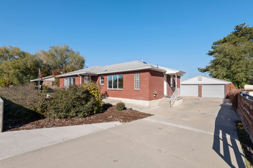 Updated and built to last. Classic brick rambler you'll be proud to call home. Delivering bright, light-filled living spaces and flexibility! A fully equipped ADU/Mother-in-Law apartment with its own parking & walkout basement entrance offers options for multi-generational living or rental income. The detached two-car garage adds even more storage or awesome hobby space. Low maintenance zero scaped front yard and private backyard. Move-in ready with appliances included, this is the kind of home that can make life easier. Convenient location, less than 15 minutes to both SLC Airport and downtown Salt Lake City! All information provided deemed reliable, but not guaranteed; buyer/agent