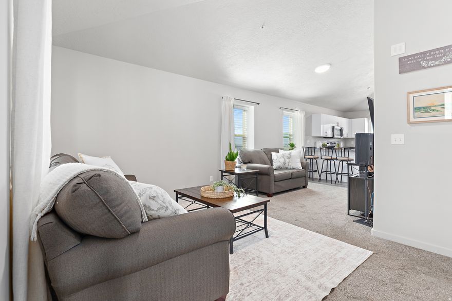 This condo qualifies for a $5K Credit from Keybank Lending. Flyer is attached to this Listing. This condo is the perfect, affordable opportunity to step into homeownership! Beautiful top-floor end-unit in Provo featuring 2 bedrooms, 1 bathroom, and incredible mountain views with added lake views! Being on the upper level means no neighbors above you, plus extra privacy and great natural light throughout. As an end unit, you'll also enjoy additional windows that make the home feel bright and open. The kitchen and entryway feature upgraded LVP flooring, and the living room and hallway have upgraded carpet padding, making the space feel more comfortable and inviting. The home has been very clean, well cared for, and the homeowner has not had any pets. Great location close to shopping, restaurants, parks, and with quick freeway access, making commuting easy. Includes one assigned covered parking space, and one unassigned uncovered parking space. Square footage figures are provided as a courtesy estimate only and were obtained from county records. Buyer to verify all information.