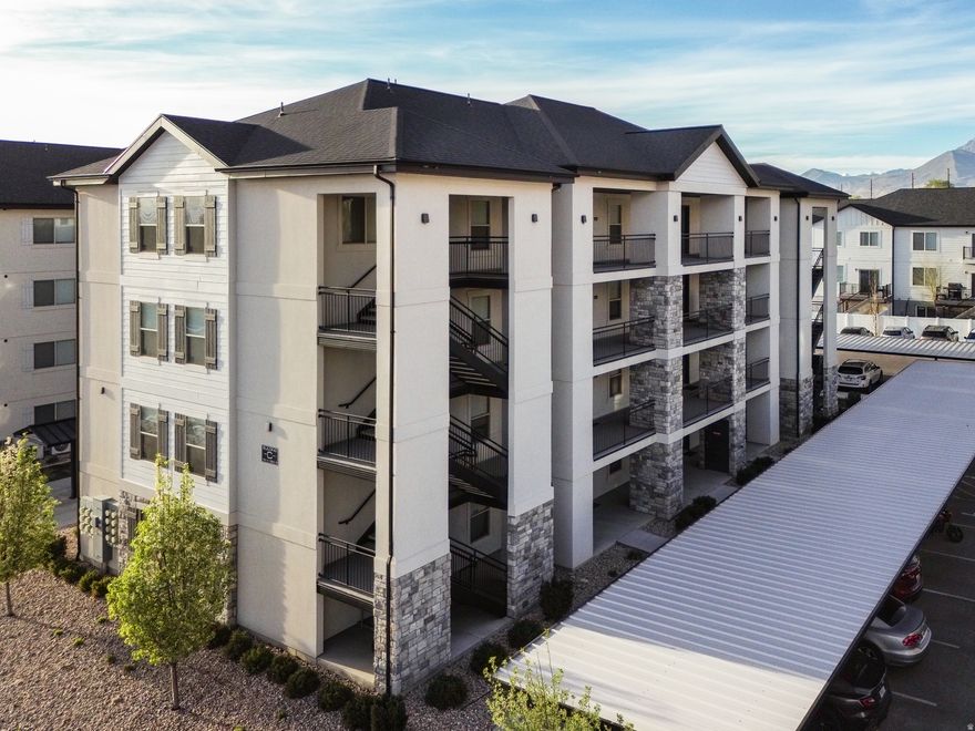 This condo is the perfect, affordable opportunity to step into homeownership! Beautiful top-floor end-unit in Provo featuring 2 bedrooms, 1 bathroom, and incredible mountain views with added lake views! Being on the upper level means no neighbors above you, plus extra privacy and great natural light throughout. As an end unit, you'll also enjoy additional windows that make the home feel bright and open. The kitchen and entryway feature upgraded LVP flooring, and the living room and hallway have upgraded carpet padding, making the space feel more comfortable and inviting. The home has been very clean, well cared for, and the homeowner has not had any pets. Great location close to shopping, restaurants, parks, and with quick freeway access, making commuting easy. Includes one assigned covered parking space, and one unassigned uncovered parking space. Square footage figures are provided as a courtesy estimate only and were obtained from county records. Buyer to verify all information.