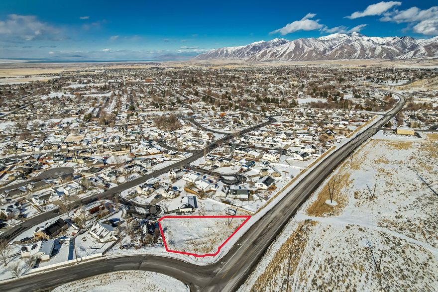 Priced to sell! A rare opportunity to build a single family or duplex in Tooele's fast-growing community. This listing includes 2 parcels adjacent to each other. The larger parcel-.38acres alone was appraised in 2023 at $160,000. nestled close the mountains, the gradual slope of the property provides mountain views and of the Great Salt Lake. Quiet streets, clean air, and open skies-the perfect balance of city access and peaceful living.
