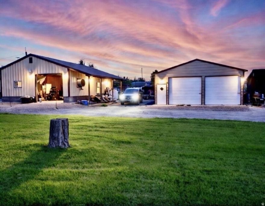 This 3 bed, 1.75 bath home sits on a large .6 acre lot and comes with 2 garages for 6 cars or a bunch of toys. The large 4 car garage is fully insulated, heated and cooled for the year round hobbyist and even comes with a built-in compressor and equipped for automotive painting. The 2-car garage with loft storage is equipped with a pulley lift system. The home and yard have been very well maintained. The home even has a new metal roof.