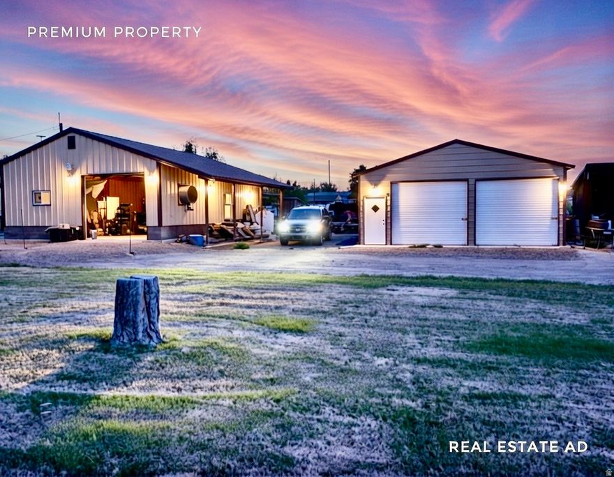 This 3 bed, 1.75 bath home sits on a large .6 acre lot and comes with 2 garages for 6 cars or a bunch of toys. The large 4 car garage is fully insulated, heated and cooled for the year round hobbyist and even comes with a built-in compressor and equipped for automotive painting. The 2-car garage with loft storage is equipped with a pulley lift system. The home and yard have been very well maintained. The home even has a new metal roof.