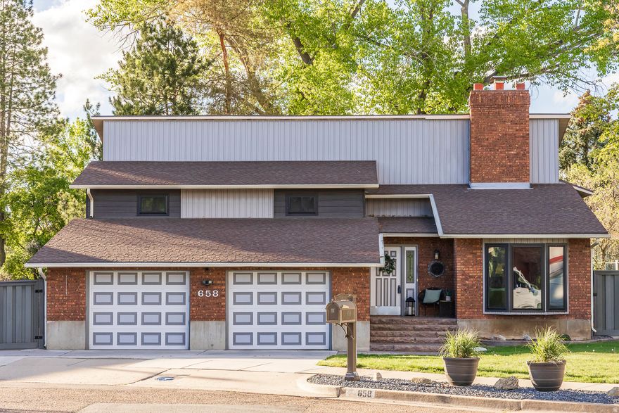 NEW PHOTOS! Open House 11 am to 2 pm Saturday April 18th. Beautiful 4 bed, 3 bath home located on a quiet cul-de-sac and sitting on an impressive .32-acre lot! This immaculate, well-cared-for property features granite countertops, updated lighting, and numerous recent upgrades throughout. Enjoy peace of mind with a new sprinkler system (2023), new carpet, fresh paint, and triple-pane windows (2024), plus a new furnace (2025). Additional updates include newer window coverings and a new dishwasher and microwave (2026).  Step outside to a covered deck perfect for relaxing or entertaining, along with RV parking and extra storage in the 12' x 7' shed. This home is also equipped with a whole house generator for added security and comfort. Conveniently located near the Riverdale Weber River Parkway Trail. Washer, dryer, and refrigerator are negotiable. Don't miss this incredible opportunity!