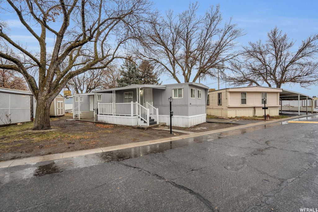Photo of 3087 S HOMECREST ST, West Valley City, UT 84119 (MLS # 2130138)