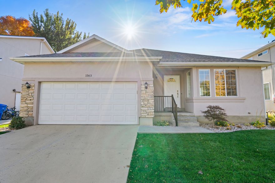 Welcome Home! Tucked away in a picturesque, tree-lined neighborhood, this beautifully maintained home offers the perfect blend of comfort, charm, and convenience. With 6 spacious bedrooms and 3 baths, there's plenty of room for everyone to spread out and enjoy. Move in with confidence-all the major updates are already done! The main-level windows, roof, and HVAC have been replaced, and the carpet feels practically new. Every inch of this home has been cared for with exceptional attention and pride. You'll love the flexibility of laundry hookups on both the main level and downstairs, making daily living even more convenient. Step outside and you're just a three-minute stroll to a fabulous park, perfect for playtime or peaceful walks. Commuters will appreciate the easy access to Highway 89, and you'll be just minutes from Lagoon, great shopping, and the local Maverik gas station. Golfers-your next round is less than five minutes away. The neighborhood HOA is easy-going and just $11/month, covering the maintenance of two private parks and even the beloved annual neighborhood Easter egg hunt. More than just a house, this is a place where life unfolds and memories are made. Come see why you'll want to call it home. Square footage figures are provided as a courtesy estimate only and were obtained from county records. Buyer is advised to obtain an independent measurement.