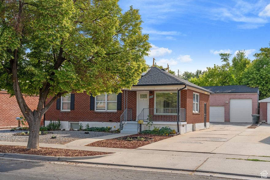 Charming Liberty Wells home just minutes from Liberty Park and Sugar House. This spacious 4-bed, 2-bath offers flexible living with a separate entrance to the basement apartment-ideal for rental income or multi-generational living. The upstairs features classic charm and inviting living spaces, while the basement includes a full second kitchen plus central storage and laundry. Outside, enjoy a fenced backyard and a large detached 2-car garage with loft storage, workshop space, and an extra-high door for oversized vehicles. Conveniently located near downtown, shopping, dining, and freeway access, this home offers both comfort and versatility.