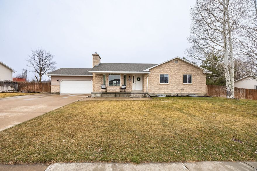Spacious rambler in desirable North Logan featuring a walk-out basement and beautiful mountain views. The fully fenced backyard backs to a peaceful horse pasture that is unlikely to be developed, offering added privacy. Warm greige paint, newer granite in the kitchen and baths, and updated carpet and baseboards create a clean, well-maintained feel. Includes a 2-car garage, backyard shed, and a neighborhood that the sellers truly love. Buyers to verify all. Don't miss the 3D tour!
