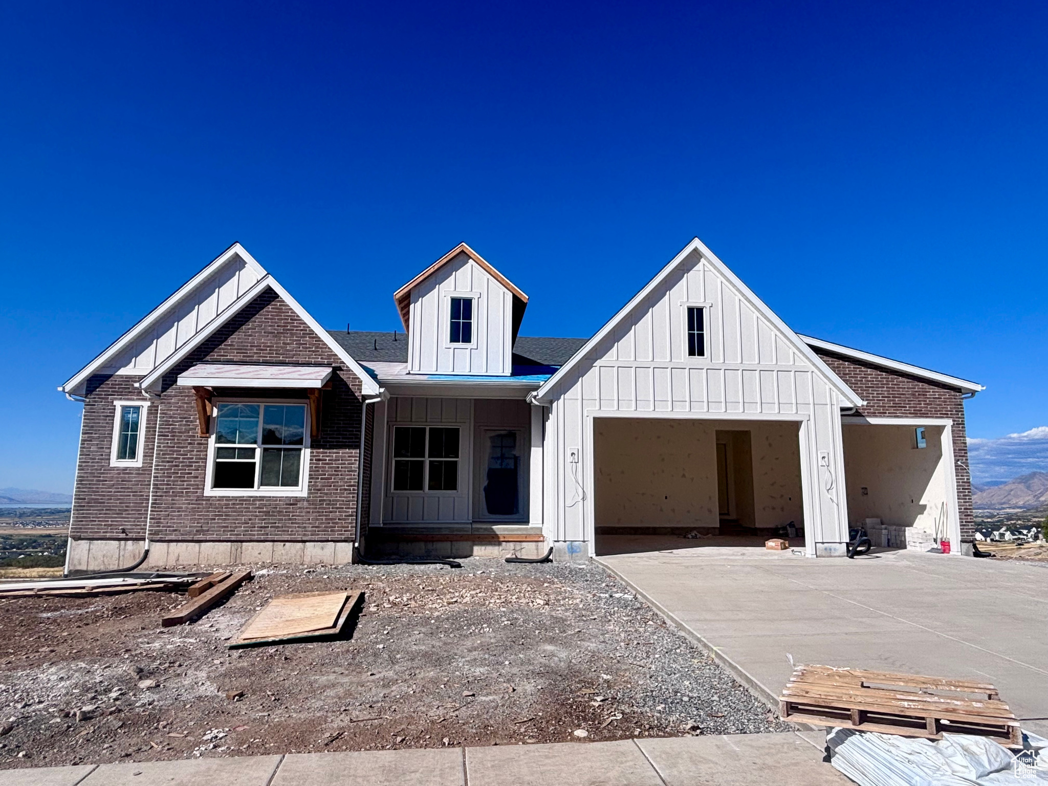 Conveniently located just 20 minutes South of Provo - The ever-popular Evans plan is the perfect home for anyone looking for main floor living with impressive space for entertaining. Highlights include sizeable laundry room, open concept kitchen/dining/living, 12' ceilings in the great room and primary bedroom, plus a stunning covered deck. Private primary bedroom and bathroom complete with separate vanities, stand-alone tub, and its own covered deck. Designer Appointed Collection is Modern Farmhouse Lux. This homesite in particular is truly one-of-a-kind MUST SEE. Financing incentives available.