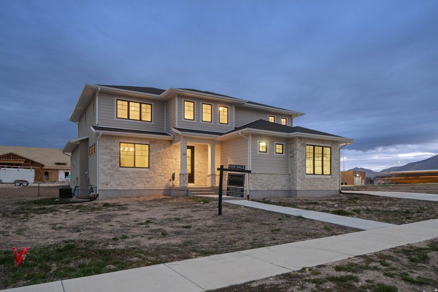 Limited-Time Incentives  Don't Miss This Opportunity!  Take advantage of an incredible 3-2-1 rate buy-down incentive offered by our preferred lender & builder-making this home more affordable than you might expect! Welcome to Davis Farms in Salem, featuring the highly sought-after Brae Plan by Dandelion Farms, a semi-custom builder known for quality and thoughtful design. This home truly stands out with: Oversized 3-car garage Finished basement with a 2-bedroom ADU (private entrance & laundry) - perfect for generating rental income or multi-generational living Prime corner lot location directly across from Salem Jr. High 4 spacious bedrooms upstairs Beautiful finishes throughout, including stainless steel appliances and numerous upgrades Enjoy the freedom of NO HOA, giving you flexibility and long-term value.  Conveniently located near Stokes Marketplace, Ace Hardware, and more-everything you need just minutes away. Whether you're looking to offset your mortgage with rental income or secure a home with long-term potential, this property checks all the boxes.  Act now-homes with this kind of incentive and income potential don't last long! Square footage figures are provided as a courtesy estimate only and were obtained from building plans. Buyer is advised to obtain an independent measurement.