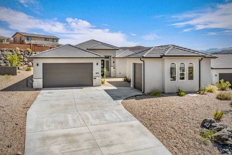 Vacant and easy to show! Enjoy desert living in this comfortable, single-level custom home, with a separate Casita and stunning valley views in Fire Rock!! This home boasts an entry courtyard, 4 beds, 3 baths, custom finishes throughout, RV parking, a spacious garage, large lot and no HOA. Relax and entertain with open concept living, and an oversized covered patio, along with the simplicity of xeriscaped landscaping. This home truly stands out and is priced to sell! Minutes from daily conveniences, Sand Hollow, golf and endless outdoor activities! Information provided as a courtesy, buyer to verify.