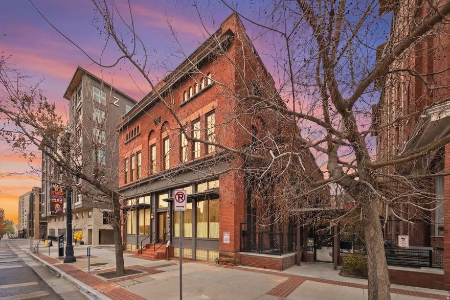 Live in the heart of downtown Salt Lake City's Historic Warehouse District, one of the city's most vibrant and walkable neighborhoods. From this stylish luxury condo, you are just steps from the Delta Center, home to Utah Jazz basketball, the excitement of Utah Mammoth professional hockey, major concerts, and year-round events that bring energy to downtown. Offered at $389,000, this beautifully designed one-bedroom residence offers 955 square feet of character-filled living space where historic architecture meets modern comfort. Inside, soaring ceilings and original exposed brick walls create an authentic loft-style atmosphere, complemented by a private balcony, generous kitchen storage, gas range, and in-unit laundry. The home also includes a dedicated garage parking space, a rare convenience in downtown living. Nearby TRAX light rail and FrontRunner make it easy to travel throughout downtown Salt Lake City, the airport, and the greater Wasatch Front. For buyers seeking a truly turnkey opportunity, the condo can also be purchased fully furnished, showcasing sophisticated interiors designed by Lars Taylor Studios. This makes it an ideal option for a second home, a stylish city residence, or a move-in ready home for those relocating to Salt Lake City. Step outside and enjoy everything that makes downtown living so desirable. Walk to Jazz and Mammoth games at the Delta Center, explore restaurants, cafs, and nightlife in the Warehouse District, shop and dine at The Gateway, or spend weekends at Pioneer Park's beloved Farmers Market and outdoor concert series. The secure, pet-friendly community offers residents a beautifully landscaped private courtyard with firepit, barbecue area, and lounge seating designed for relaxing and socializing. Additional amenities include dedicated EV charging stations and controlled building access. Whether you are searching for a sophisticated urban home, a lock-and-leave city retreat, or a well-located property near the University of Utah and downtown employment centers, this move-in ready residence delivers exceptional lifestyle and convenience in one of Salt Lake City's most exciting neighborhoods.