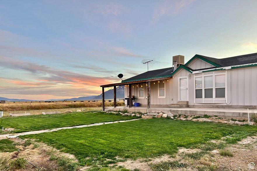 Seller's have entered into a lease option agreement for 2 years. Home is now occupied by the buyers. DO NOT CONTACT.   Experience ranch living on 5 ACRES complete with a spacious shop! Embrace the quiet life in this updated manufactured home featuring  a nice open floor plan. Enjoy new lighting, flooring, paint, and moldings throughout. Modern comforts include a new furnace/AC and a tankless water heater. The home offers propane gas, a private well, and septic tank. Warm up by the wood burning stove in the living room area. The property also includes a 2-car garage with its own wood burning stove. Take in 360 -degree views of the valley and mountains from your covered porch. Conveniently located near Maple Canyon, Wale's Reservoir, and Log Canyon. This is country living at its finest!!