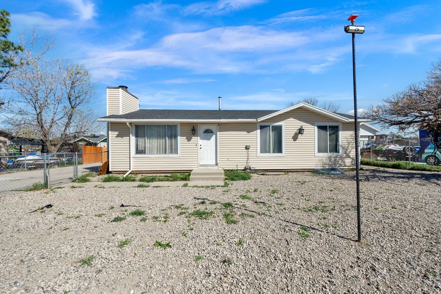 Charming and well-maintained rambler featuring 6 bedrooms and 3 full bathrooms, offering over 2,100 sq ft of living space. The fully finished basement provides plenty of room to grow, while the functional layout includes a mix of laminate, tile, and carpet flooring. Enjoy year-round comfort with central air and gas heating. Step outside to a fully fenced yard with ample parking, including RV parking. Conveniently located near schools, parks, and everyday amenities, this home offers the perfect blend of space, comfort, and value. Don't miss your opportunity to make it yours!