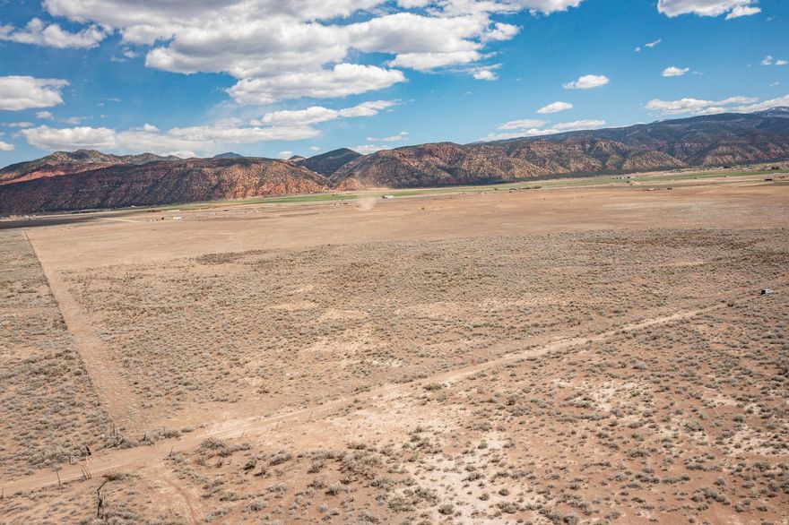 Remarkable opportunity to own a 20-acre parcel just off exit 82 on i-15 for Paragonah. With stunning mountain views and ready for you to build your perfect oasis. Zoned as A-20. Each lot comes with 1 acre-feet of water right. Parowan is an incredibly beautiful small town of just over 3,000 residents. Close to Cedar City, which is home to Southern Utah University, and the Shakespeare Festival, as well as some amazing restaurants. As part of Southern Utah, you will experience a lifestyle like no other. The area features nearby internationally recognized mountain biking trails, road cycling, hiking, golf courses, national parks such as the Grand Canyon, Zion, & Bryce, plus national moments, national forest, reservoirs, & some of the most iconic desert landscape in the world. Less than 30 minutes from Brian Head Ski Resort, there is no doubt that this is a fun place to live and play.All information herein is deemed reliable but is not guaranteed. Buyer is responsible to verify all listing information, including square feet/acreage, to buyer's own satisfaction.