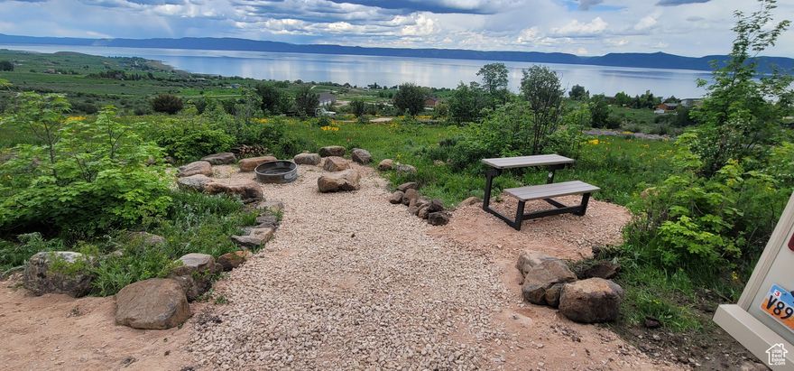 Located just over the Idaho border in scenic Fish Haven, this unique Bear Lake property offers something rare. No HOA restrictions, no dues, just open land ready for your vision. The western edge is dotted with vine maples and mature trees, drawing in local wildlife like moose, deer, and sage hens. The elevated position gives you an unobstructed view of Bear Lake and stunning sunrises over the water. Whether you're bringing your RV for immediate use or planning a future home or vacation retreat, this land offers flexibility, privacy, and lasting value.
