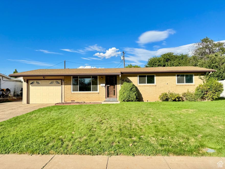 Welcome to this beautifully updated 3-bedroom, 1-bath home in the heart of Layton! Located in a desirable neighborhood near top-rated schools, Hill Air Force Base, Layton Hills Mall, and major commuter routes, this home offers both convenience and comfort. Featuring 980 sq ft of single-level living, this home boasts a spacious open floor plan with modern LVP flooring and quartz countertops. The kitchen flows seamlessly into the main living space, offering an inviting area for entertaining or relaxing. Stay comfortable year-round with efficient central air conditioning that blows cold and a reliable furnace for those chilly  winter months. A water softener system helps support healthier water quality and extends the longevity of your appliances. Outside, enjoy a fully fenced backyard equipped with a secondary water sprinkler system-perfect for low-cost summer maintenance and beautiful full lawns. Get away and get your favorite projects done in this giant beautiful rare oversized, tall 2-car detached workshop. Ideal for hobbyists, personal projects, storage, or even a home business. Imagine the sunsets from here and make this your home! Square footage figures are provided as a courtesy estimate only and were obtained from county records. All information has been provided as a courtesy only.