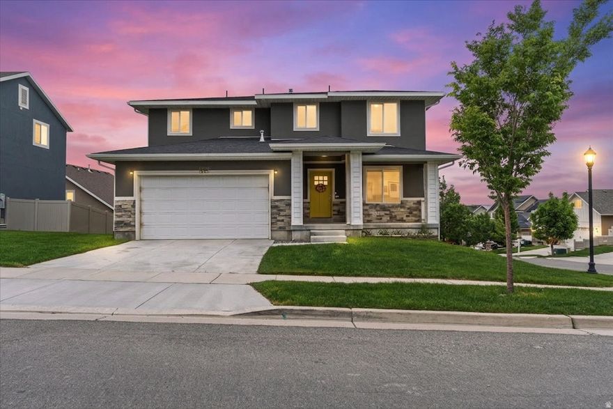OPEN HOUSE Saturday 12-2pm | Fresh price improvement on this well-kept modern Bluffdale home with no HOA restrictions. Thoughtfully designed for both comfort and functionality, the home features an open-concept layout with a spacious kitchen complete with stainless steel appliances, modern finishes, and a large island ideal for entertaining and everyday living. The light-filled main living area flows seamlessly into the private backyard, offering space to relax, play, or grow into. Upstairs, the primary suite provides a quiet retreat with a walk-in closet and upgraded en-suite bathroom. A versatile flex space near the entry makes a great home office, sitting area, or reading nook. Conveniently located just minutes from I-15 with quick access to both Salt Lake and Utah County amenities, dining, and shopping. With the new price adjustment, this home presents an exceptional opportunity in one of Bluffdale's fastest-growing areas. Square footage figures are provided as a courtesy estimate only. Buyer and Buyer's agent to verify all. Some listing photos are virtually staged.