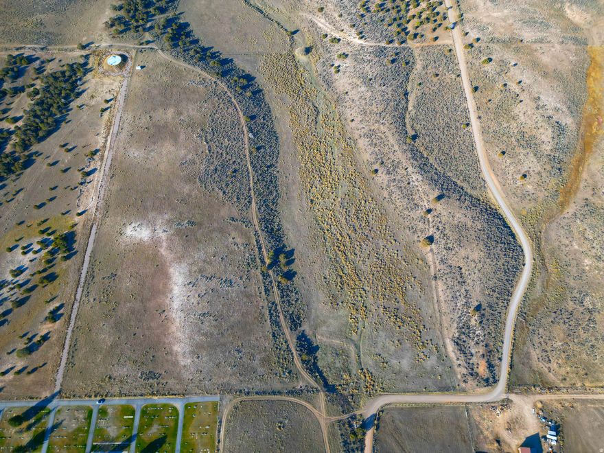 Discover 42.54 acres of peaceful Fairview countryside with endless potential and some of the best views in the valley. Located just 40 minutes from Spanish Fork and tucked directly behind the Fairview Cemetery, this property offers the quietest neighbors you could ask for and a level of serenity that's getting harder to find. Wide-open space, rolling terrain, and unobstructed mountain vistas make this an ideal location for a private homestead, recreational retreat, or future investment opportunity. Included is a valuable water right-equivalent to 2.712 acre-feet, providing options for future use, development, or agricultural needs. And when you're looking for adventure, simply head a short drive-up Fairview Canyon to the Manti-La Sal National Forest, where you'll find endless recreation including hiking, fishing, ATV riding, camping, and world-class snowmobiling. With easy access from town yet complete privacy, this exceptional acreage offers the perfect blend of convenience, recreation, and seclusion. Opportunities like this don't come around often. Come experience the views, the space, and the potential waiting for you on this remarkable Fairview parcel. Boundary lines shown are approximate and based on county plat maps and existing landmarks.  A professional survey is recommended to determine exact property boundaries.  All information within is provided as a courtesy only.  Buyer and Buyer's agent are advised to complete their own due diligence and independent measurements.