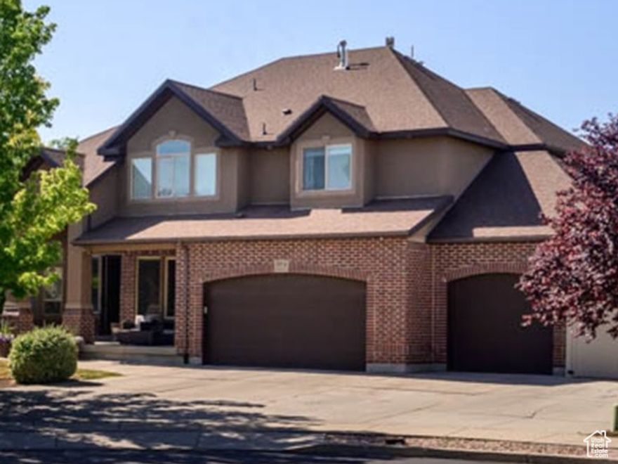 Beautiful South Jordan Home by Perry Homes  Original Owner  Nestled in a peaceful double cul-de-sac with only one entrance and exit, this stunning South Jordan home offers exceptional privacy and a true sense of community. Built by Perry Homes and lovingly maintained by its original owner, this residence combines timeless design with thoughtful functionality.  The front room with soaring vaulted ceilings, flowing seamlessly into a formal dining area- The home features 10-foot ceilings throughout, including in the finished basement.  The spacious kitchen opens to the family room and is equipped with a built-in double oven, microwave, gas range, and a nearby half bath. A mudroom is conveniently located off the oversized three-car garage. Just off the entry, a private den or office provides a quiet work-from-home space. A central vacuum system adds ease throughout the home.  Upstairs, you'll find four generously sized bedrooms, including a beautiful master suite complete with a walk-in closet, dual vanities, a double-sided fireplace, garden tub, and separate shower. Two additional bedrooms share a Jack and Jill bathroom, and the laundry room is ideally located on the second floor.  The fully finished basement offers two more bedrooms, a three-quarter bath, a large family room with a wet bar (featuring a microwave and mini fridge), plus two storage rooms-one of which is a cold storage room located beneath the front porch.  Outside a beautifully landscaped backyard with mature trees, a spacious grassy area, a deck with pergola, hot tub, basketball standard, and trampoline. There's also a shed for storing yard tools and equipment, along with double RV parking and a gate beside the garage for easy access.