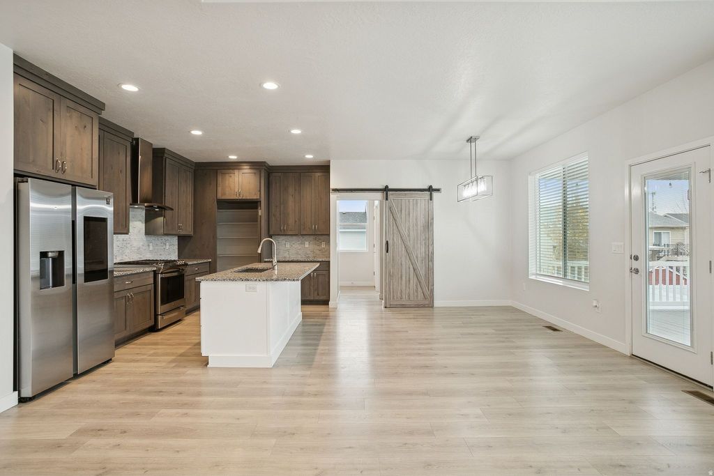 Photo of 895 DUNES DR, Syracuse, UT 84075 (MLS # 2122760)