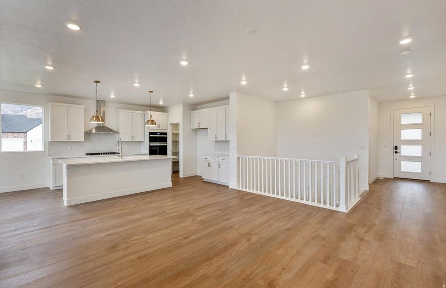 New beautiful rambler in Salem near the mountains on 0.34 acres! Main floor living! Rare large yard with a new build home. Located on a on a corner of the quiet cul-de-sac, this home has amazing upgrades with a 3-car garage, quartz countertops throughout the home, and a fireplace. The open floor plan is perfect to spend time with family or entertaining. The chef kitchen features a vented hood, gas cooktop stove, and built-in double ovens. Includes front yard landscaping and a covered patio in the backyard. Come see this beautiful home for yourself!