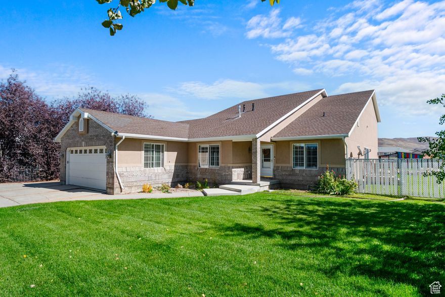 Here it is - high end finishes on a 1.2 acre horse property with an additional  24'x32' garage/workshop for all your toys. Interior details include a large kitchen and work station with hickory cabinets, tile, oversized jetted tub & air conditioning. 2 Types of heat radiant floors and forced air. Outside enjoy a yard that's landscaped & fully sprinkled with decks galore, a rock fire pit and chicken coop. This property does have a shared well with other homes in the Unita Shadows subdivision, shares are through Beaver Shingle Creek.