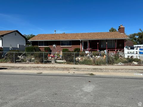Photo of 2322 W SURREY RD, Taylorsville, UT 84129 (MLS # 2115710)