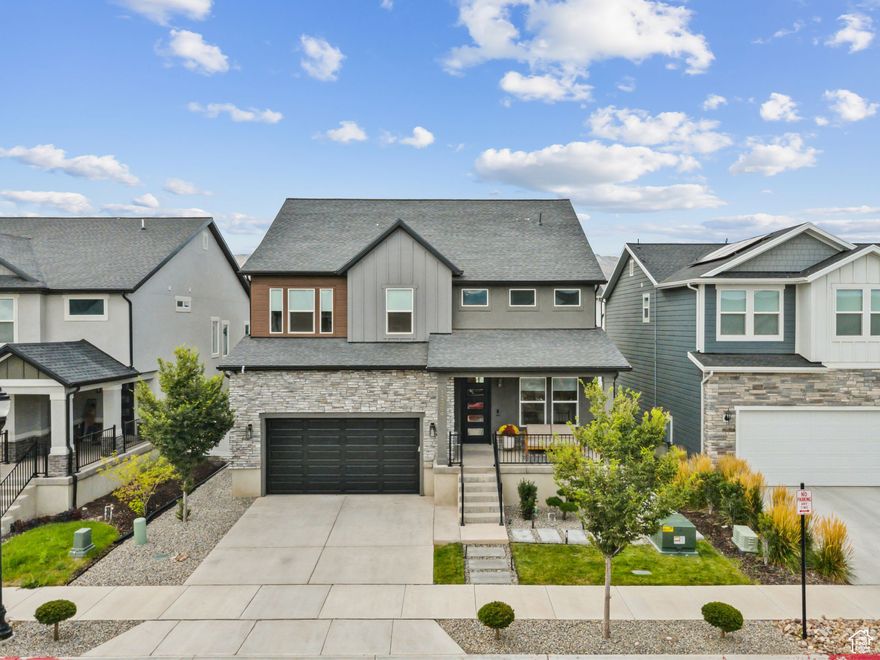 Step into contemporary living with this stunning home. Vaulted ceilings for a grand entrance gives it the WOW factor! The kitchen has been upgraded to the max with lavish appliances, high-end cabinents and finishes, all included. Enjoy a fully finished yard with flurishing trees and pergula for extra privacy. Four bedrooms PLUS an office gives you plenty of space and time to finish the basement at your own pace (ask listing agent for great contractor's info) Bright open rooms, large windows with electronic blinds, cast-iron railings, this home shows meticulasly like new in this growing Herriman neighborhood. A must see!