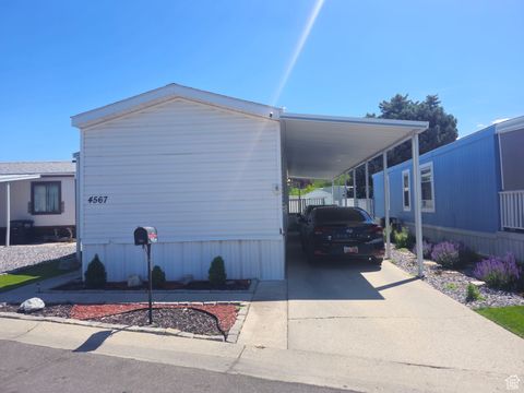 Photo of 4567 S YARROW LN W #86, Taylorsville, UT 84123 (MLS # 2089862)
