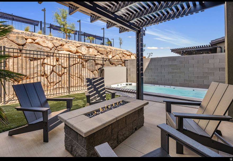 Turn-Key Short Term Rental With Private Swim Spa and Pergola Near Sand Hollow.     Experience resort-style living in your own backyard. This brand new, turn-key short-term rental in Washington City features a custom in-ground swim spa pergola designed for year-round relaxation - standout upgrades that set this property apart from standard builds.  Inside, the fully furnished 4 bed / 4.5 bath layout offers a bright, modern interior with thoughtfully curated furniture and a layout designed to comfortably host larger groups. Ensuite bathrooms in every bedroom provide privacy and convenience, a top priority for short-term rental travelers.    Community Amenities   Resort-style pool   Pickleball courts   Basketball court   Playground & recreation space  Turn-Key Investment Highlights  STR-approved community   High-quality furnishings + full setup included   Private backyard built to drive premium nightly rates   2-car garage + guest parking     Prime Southern Utah Location   ~7 minutes to Sand Hollow Reservoir   ~13 minutes to Costco & major shopping   ~20 minutes to downtown St. George   ~45 minutes to Zion National Park    A rare opportunity to acquire a fully operational STR in a thriving vacation market - upgraded, guest-ready, and positioned for immediate income.      Square footage figures are provided as a courtesy estimate only. Buyer is advised to obtain an independent measurement.  Owner/Agent