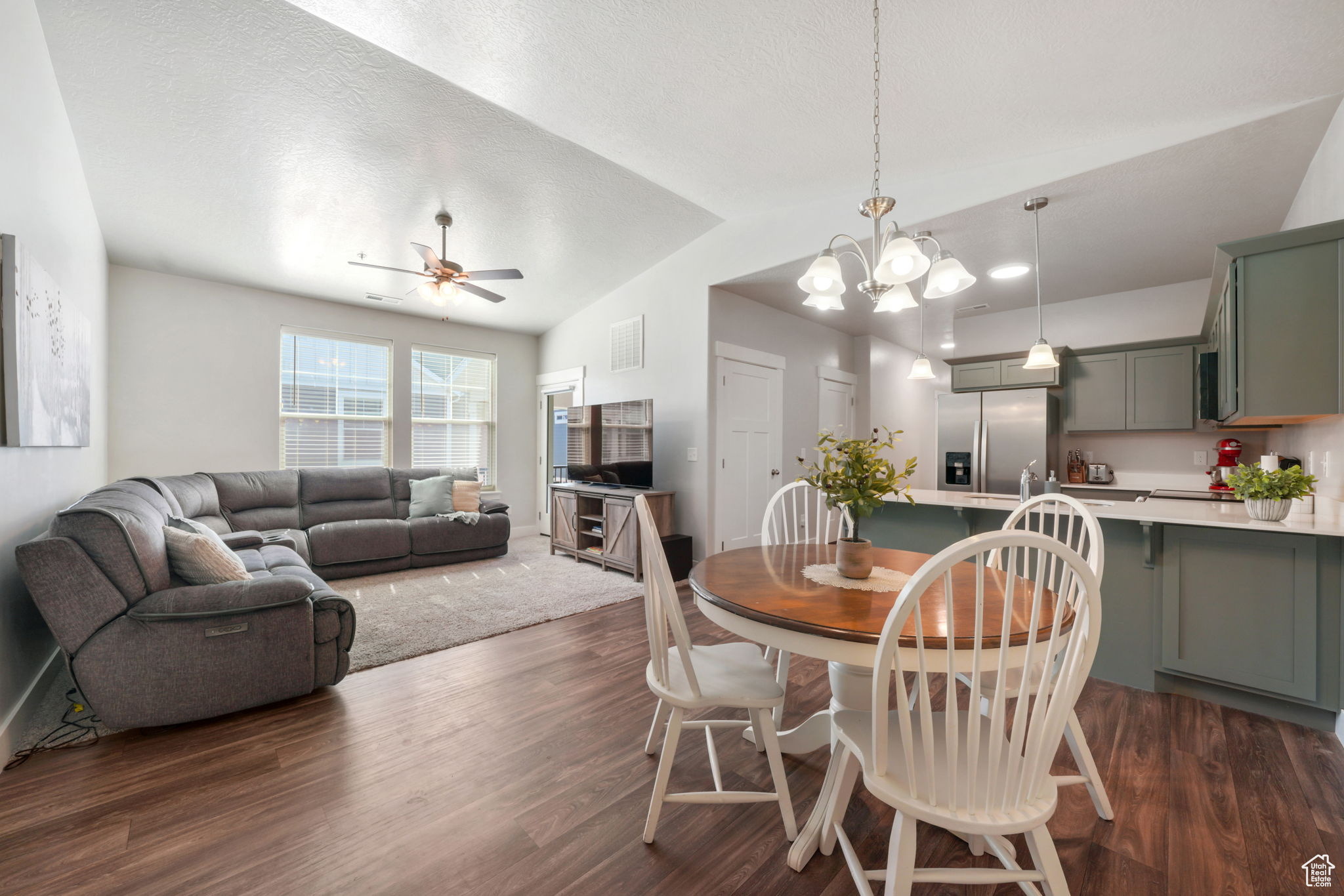 Live at the center of it all in this top-floor condo located in Vineyard's sought-after LakeFront community. Just steps from the Utah Lake Shoreline Trail, you'll enjoy daily walks or bike rides with panoramic lake and amazing mountain views, plus breathtaking sunsets from your own balcony. Surrounded by parks, splash pads, and trails, this area is designed for families and outdoor living - all just minutes away. Inside the community, enjoy access to a pool, clubhouse, fitness center, and sports courts, with beautifully maintained green spaces and playgrounds throughout. The home itself features vaulted ceilings, top-floor privacy, and a bright, open layout. You're also minutes from TopGolf, Megaplex Theatres, dining, shopping, I-15, and the FrontRunner - making this an unbeatable location for both lifestyle and long-term value. Whether you're a first-time buyer, investor, or looking for a family-friendly home near it all, this condo delivers the full package.