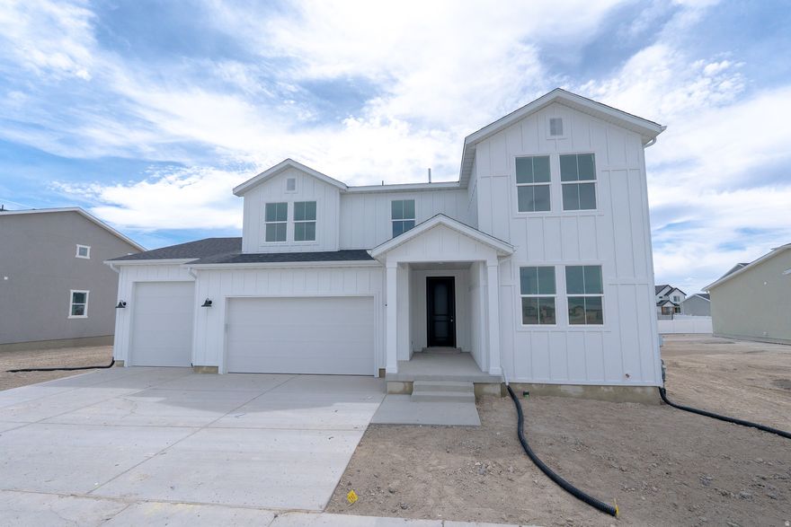 NO HOA!!! Estimated completion in July. This spacious 2 story home features 5 bedrooms, 3 bathrooms, a 4-bay tandem garage, and a full unfinished basement. The main floor offers a guest bedroom, full bath, and an open-concept great room. The gourmet kitchen shines with white craftsman cabinets, quartz countertops, and stainless-steel built in appliances. Upstairs, discover a versatile loft, convenient laundry, and a luxurious owner's suite with separate tub/shower and dual vanities. Square footage figures are provided as a courtesy estimate only and were obtained from builder. Buyer is advised to obtain an independent measurement.