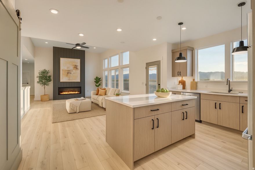 Fall in love with a home designed to make everyday living feel special. The main level offers two comfortable bedrooms, a chef-inspired gourmet kitchen perfect for gathering and entertaining, and a spacious primary suite created for rest and relaxation. Every space is thoughtfully designed to balance comfort, functionality, and style. The impressive 4-car garage provides plenty of room for vehicles, hobbies, storage, and all your weekend toys. Step outside and take in the breathtaking views of Deseret Peak, a daily reminder of why this location is so special. This is more than just a home-it's a place to settle in, unwind, and enjoy the lifestyle you've been waiting for. Schedule your showing today and experience it for yourself. Square footage figures are provided as a courtesy estimate only and were obtained from the plans. Buyer is advised to obtain an independent measurement.