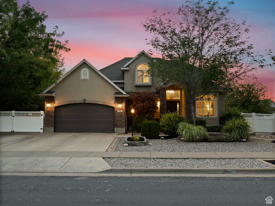 **Experience English Contemporary Elegance in Kaysville** Built in 1998 and completely transformed, this stunning two-story Kaysville residence masterfully blends traditional architecture with the layered aesthetic of English Contemporary design. Situated on a generous .22-acre corner lot, the home's exterior makes an immediate statement with exquisite xeriscape landscaping and a massive 56-foot RV pad along the south side of the property. The backyard is a private sanctuary, featuring an idyllic waterfall, a covered pergola perfect for outdoor dining, a swing set, and an in-ground trampoline. Relax and unwind in the included hot tub -- your personal oasis awaits. Step inside to a professionally curated interior where every detail is intentional. A professional painter and artist collaborated on the design, meticulously selecting every paint color, wall fixture, and light source to create a unique atmosphere that shifts with the time of day. This layered aesthetic is evident everywhere, from the stunning stone arch above the kitchen sink to the elegant tray ceiling in the primary bedroom. Beyond its artistic design, this home is built for modern living with impressive functional amenities, including: A convenient laundry chute; doors that open directly to the backyard oasis; a luxurious primary bedroom with a full en suite with large upgraded shower; and generous cold storage. The sale also includes high-end Samsung appliances, a full entertainment system in the basement, and perfectly organized RGB lighting for the ultimate custom ambiance. Enjoy the ideal Kaysville location with close proximity to a wealth of community features, including stocked fishing ponds, Davis Tech Park, Davis Park Golf Course, and Lagoon Amusement Park. This is a truly special property that must be experienced in person.