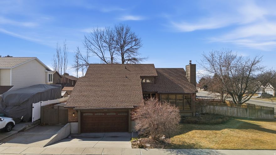 Warm, inviting, and move-in ready, this 5-bedroom Sandy home offers an open, light-filled layout perfect for everyday living and entertaining. The main living room and kitchen create a bright gathering space, featuring KitchenAid appliances and refrigerator included. Enjoy beautiful mountain views in the front and the covered deck and lower patio in the spacious backyard, ideal for outdoor entertaining. Recent updates include two new furnaces, a newer water heater, and a freshly painted exterior. Located minutes from canyon access for hiking, biking, and outdoor recreation, this home combines comfort, location, and lifestyle.