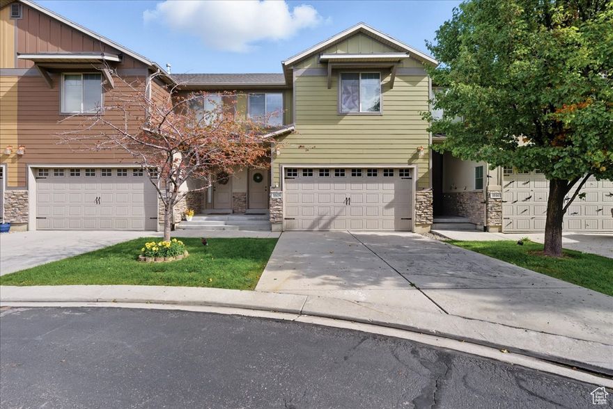 OPEN HOUSE SATURDAY 12-2. SHOWINGS AVAILABLE AFTER OPEN HOUSE. This beautiful 3-bedroom, 2.5-bath townhome at 10459 S Sage Wood Dr in South Jordan combines comfort, space, and style in a prime location near Bangerter Highway. The main floor features an open living area with high ceilings, plenty of natural light, and a modern kitchen with granite countertops, stainless-steel appliances, and a large island that's perfect for cooking or gathering. A convenient half bath and a private patio make the space ideal for entertaining or relaxing outdoors. Upstairs, the primary suite offers a peaceful retreat with elegant wall detailing, a ceiling fan, and a spacious bathroom that includes dual sinks, a soaking tub, and a separate shower. Two additional bedrooms, a full bath, and a laundry room complete the upper level. With an attached two-car garage and a quiet, well-maintained community close to shopping, dining, and parks, this home delivers both modern living and everyday convenience.