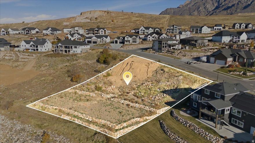 This large lot is an tremendous spot for a custom home to enjoy the amazing views of the valley and also the mountain range.  Located high up on the Pleasant View bench in a very sought after neighborhood.  Close to hiking, trails, shopping and more.  Come build your dream home in the perfect spot.