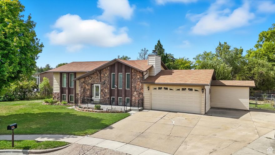 Do not miss out on the pride of ownership that shines through on this lovingly maintained home. You can easily make a 5th bedroom  in the storage room as there is already a window. The home  is located in a cul-de-sac in an amazing area, close to Hill Airforce Base, and downtown areas but tucked away in a quiet neighborhood. The addition on the back gives a large open dining and entertaining area off the kitchen upstairs, and a small multi-purpose room downstairs. There is a large driveway with lots of parking and RV parking as well. The attached shed is a perfect addition to the very nice yard, mature fruit trees and garden.
