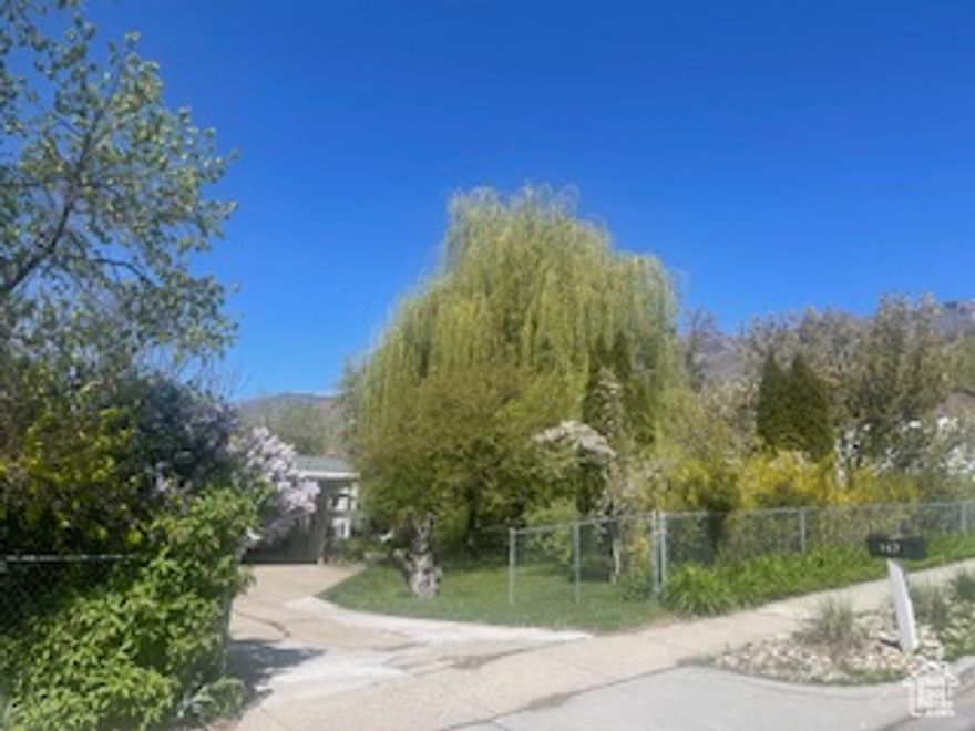 Unusual tree filled Lot...    The home is remarkable  home with hardwood floors and tile throughout. Hugh tree and a cute quaint home... Call for details to showing.     Square footage figures are provided as a courtesy estimate only and were obtained from ______________ .  Buyer is advised to obtain an independent measurement.