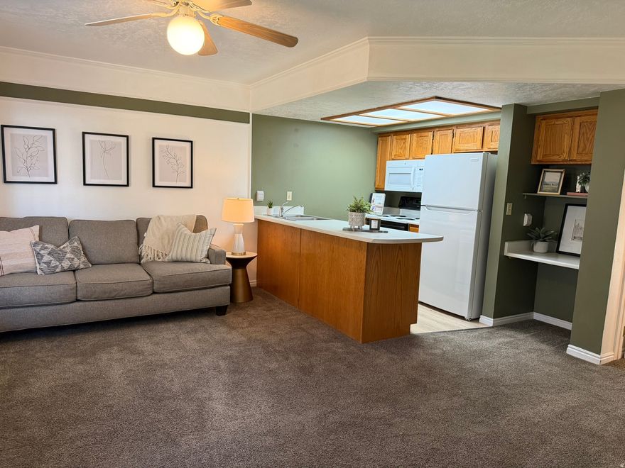 Amazing location just east of BYU campus! The apartment is move in ready for new tenants or personal use. A favorite among college students, this unit offers consistent rental demand and includes one covered parking space. The front door overlooks a beautiful park with mature trees and stunning views of Y Mountain.