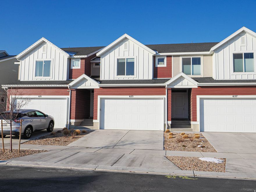 This centrally located townhouse in Utah County offers a perfect blend of comfort and convenience, featuring 3 spacious bedrooms and 3 full bathrooms designed for modern living. The home showcases beautiful hardwood flooring throughout the main living areas and includes an unfinished basement, providing endless potential for future customization or added living space. With no backyard neighbors, the property offers enhanced privacy and peaceful views, making it an ideal retreat while still being close to shopping, dining, and major commuter routes.
