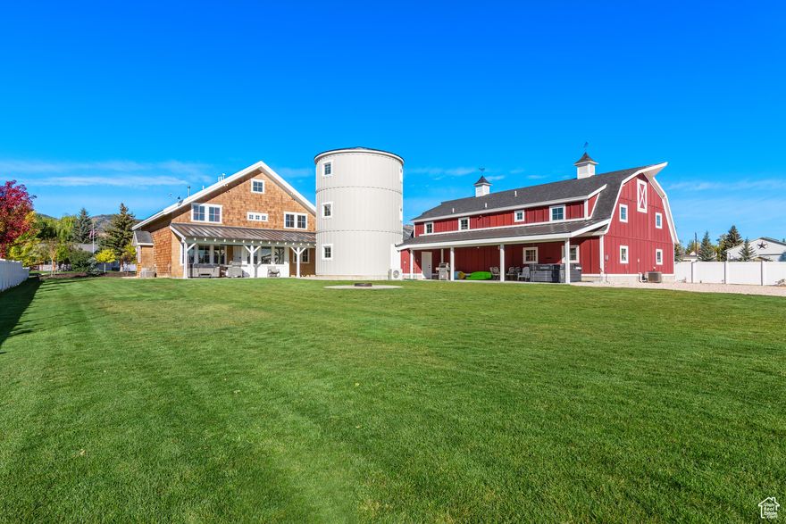 We've recently adjusted the price to make this home an even better value-come take a look! Incredible Short-Term Rental Opportunity in the Heart of Garden City! Sits on 1 acre, this unique property features a Farmhouse, Barnhouse, and Silo, each thoughtfully designed to attract guests and ensure repeat bookings. Sold together, these two expansive homes offer a combined 8,945 sq ft of living space, including 10 bedrooms, 9 bathrooms, and two oversized great rooms with spacious kitchens and dining areas-perfect for large groups. With four dedicated laundry areas, this property is both convenient and impressive.  Accommodating up to 80 guests or offering the option to rent the homes separately, this property is ideal for both small and large gatherings. Enjoy the outdoors with ample space, including two patios, two hot tubs, a fire pit, a 23x26 shop, and a 6-car shed. There's plenty of parking, including space for boats and toy trailers.  Fully self-managed, this turnkey investment includes established VRBO, Airbnb, and Google Business accounts with 5-star ratings, integrated marketing, booking, and management software (https://bearlakesilo.com/), and all in place to streamline operations. The sale also includes all furniture, furnishings, linens, a fully equipped kitchen setup, and a complete Smart Home system for remote management.  With existing bookings already generating income, this property is ready to go. Don't miss out, contact your Realtor to schedule a showing today!