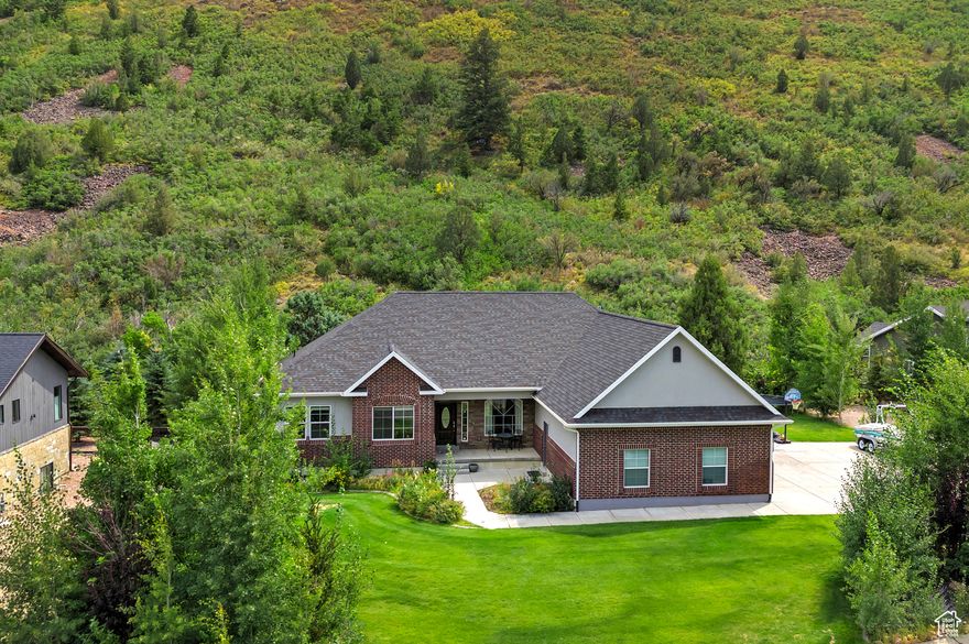 Discover this exceptional rambler in Beavercreek, set on 0.92-acre homesite with sweeping, unobstructed mountain views and no rear neighbors for outstanding privacy. Built in 2015 and offering nearly 5,000 square feet, the home blends easy single-level living with generous gathering spaces and flexible rooms to fit your lifestyle. An inviting open and flowing floor plan and a spacious kitchen are ideal for everyday living and entertaining, with abundant natural light framing the mountain backdrop. With six bedrooms and five bathrooms, there's ample space for guests and options for a home office, fitness area, or media room. A large three-car garage plus dedicated RV parking provides plenty of room for vehicles, gear, and toys. The expansive lot invites outdoor living, gardening, and play under wide-open skies. Enjoy a peaceful Kamas setting close to trails, rivers, and lakes, with a short drive to Park City dining, shopping, and world-class resorts. Opportunities like this are rare-see it today.